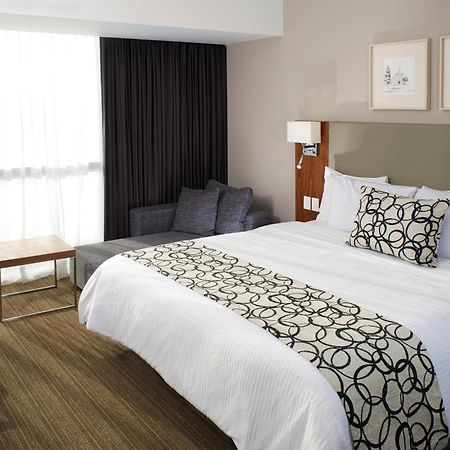 Casa Inn Premium Hotel Queretaro Exterior photo A bed runner