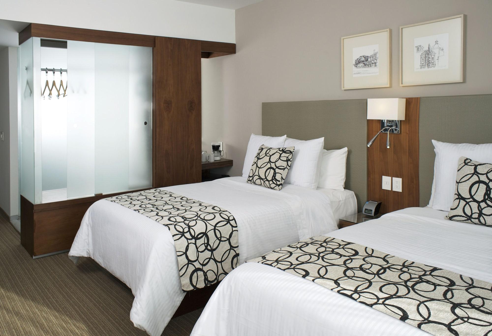 Casa Inn Premium Hotel Queretaro Exterior photo A typical room at the Westin