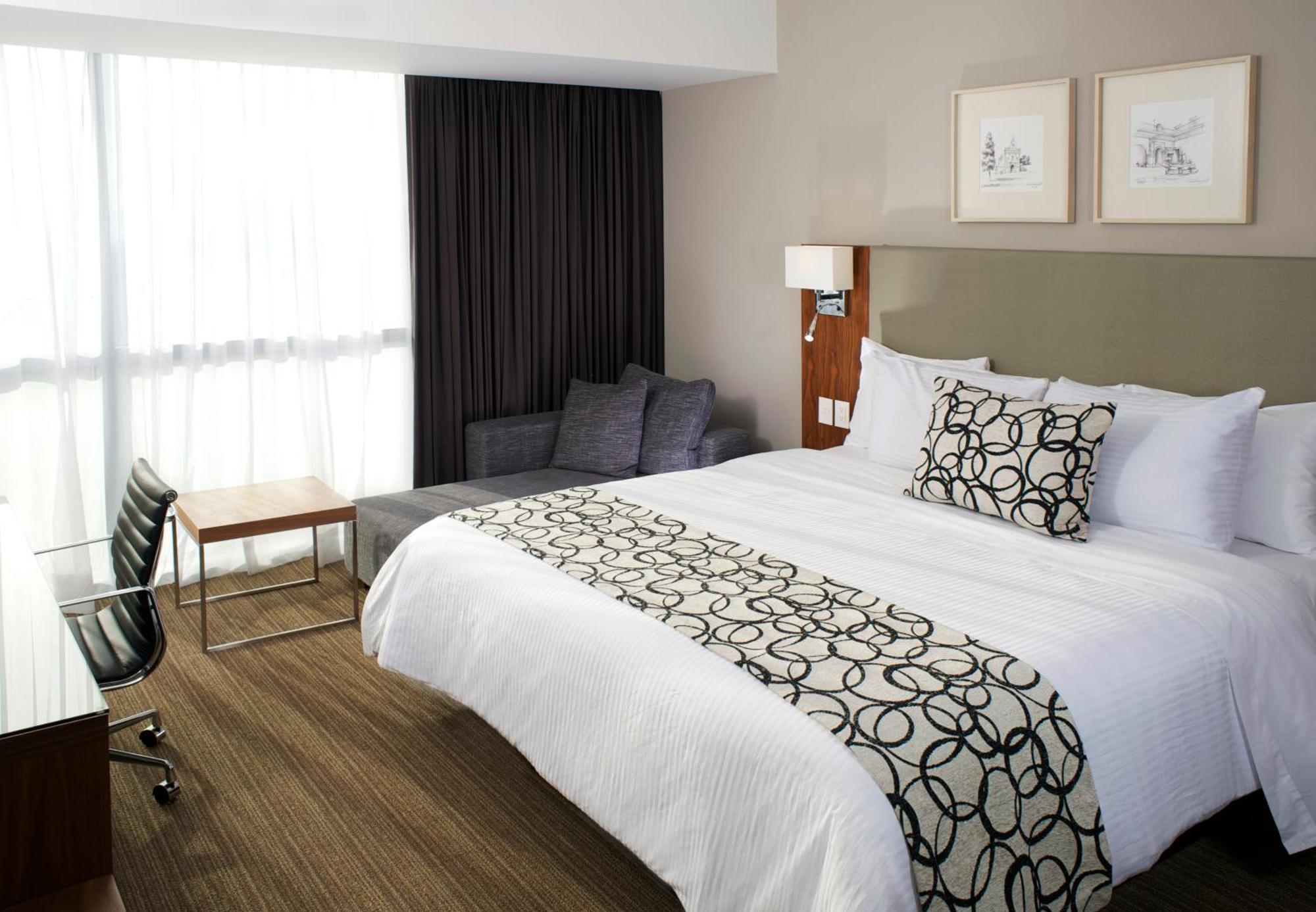 Casa Inn Premium Hotel Queretaro Exterior photo A bed runner